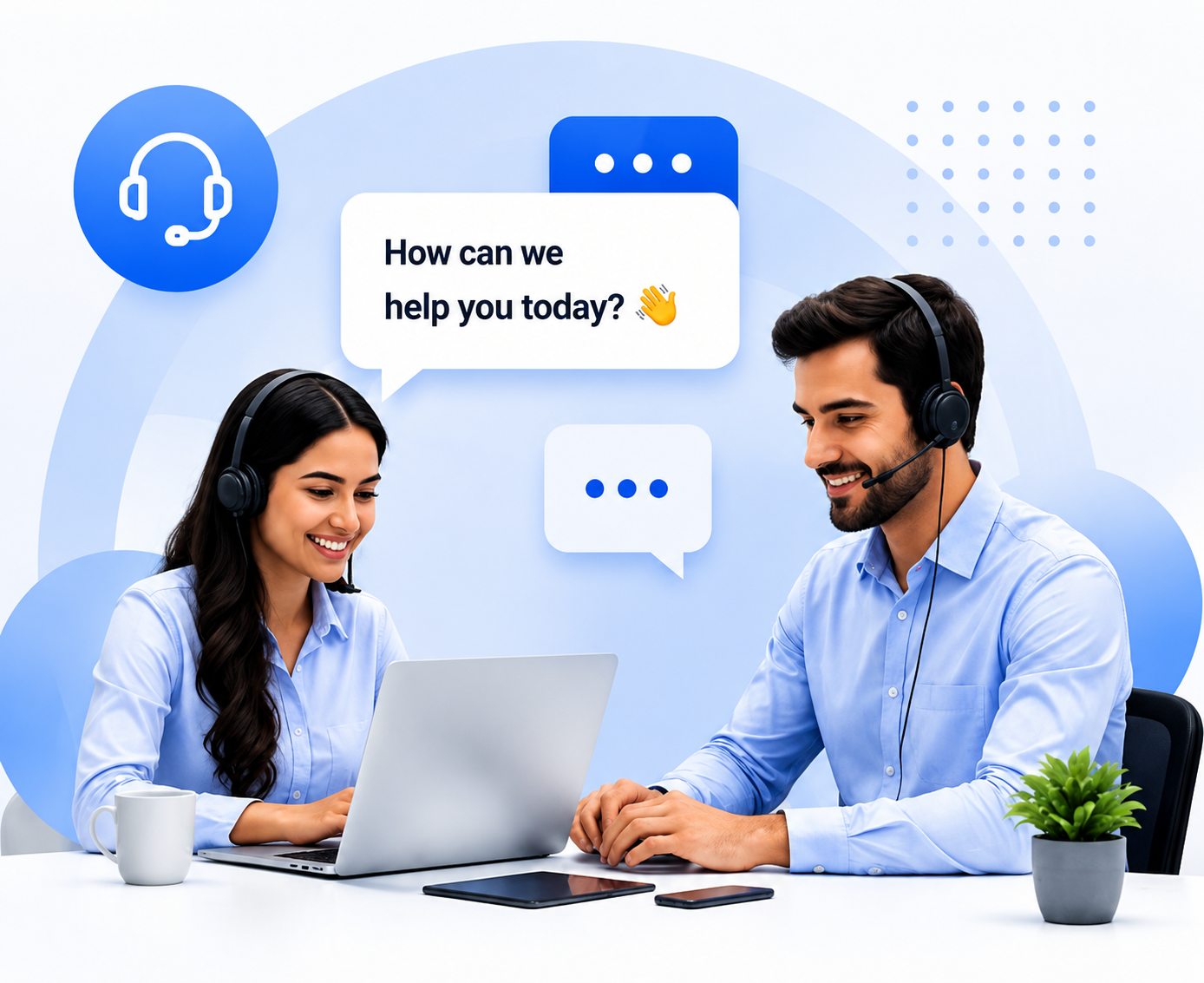 Two support agents wearing headsets helping a customer on a laptop